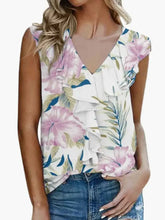 Printed v-neck tank top in white with pink hibiscus floral print green leaves and ruffled sleeves