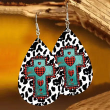 Cow print teardrop earrings with turquoise cross and red plaid hearts on iron hook