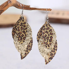 Leopard leaf earrings in layered faux leather and glittery gold