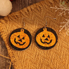 Leather pumpkin earrings: black and orange Halloween pair with silver hooks
