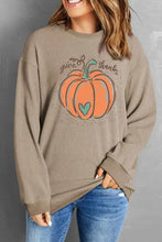 Women’s long sleeve sweatshirt with pumpkin graphic round neck design
