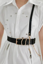 Punk PU belt with gold O-rings and shoulder strap on white shirt dress