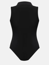 Black sleeveless quarter zip collared neck bodysuit made of smooth fabric with a zip collared neck design