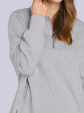 Womans gray quarter zip long sleeve hoodie with side slit and tie detail