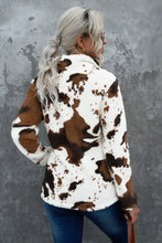 Quarter-zip long sleeve teddy sweatshirt in fuzzy white and brown cow print