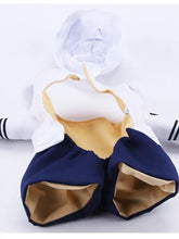 Quirky pet jumpsuit in white and navy with black sleeve stripes, tan lining