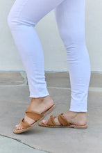 Woman in Qupid Summertime Fine strap twist sandals with white pants