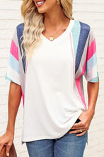 Woman in Rainbow Stripe Slit V-Neck Tee with short sleeve length