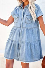 Light-wash raw hem denim mini dress with short sleeves and button-front closure in casual style