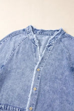 Light-wash long sleeve denim dress with raw hem button down design and frayed collar detail