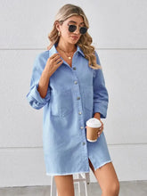 Light blue denim dress with raw hem button front and frayed hem detail in a raw hem button up denim dress