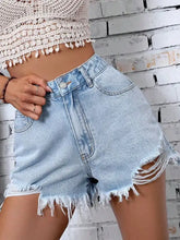Light blue raw hem denim shorts with ripped fringe hem