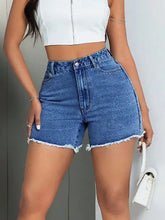 Light wash raw hem high waist denim shorts with frayed hem