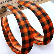 Orange and black plaid PU leather hoop earrings with faux texture