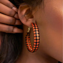 Orange and black plaid PU leather hoop earrings with woven texture