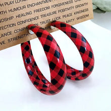 Pair of red and black plaid PU leather hoop earrings
