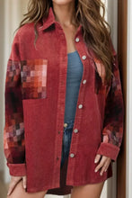 Red corduroy patchwork shirt jacket with button closure and pocket details