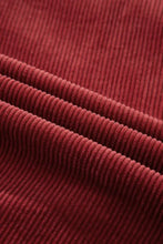 Red corduroy fabric with vertical ridges and soft texture for shirt jacket