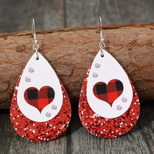 Red glitter heart leather teardrop earrings with buffalo plaid design
