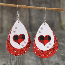 Red glitter heart leather teardrop earrings with buffalo plaid design
