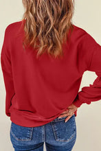 Red heart round neck dropped shoulder sweatshirt with pocket and ribbed cuffs