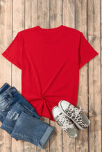 Red American Flag Heart T-Shirt with Leopard Sneakers and Jeans