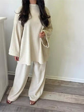 Cream-colored ribbed knit relaxed fit corduroy top and wide-leg pants set