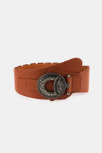 Retro elastic wide belt in rust-colored leather with ornate silver buckle