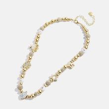 Rhinestone 14k gold-plated beaded necklace with charms and pavé accents