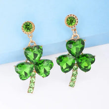 Rhinestone alloy lucky clover dangle earrings with green heart gems