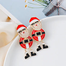Festive rhinestone alloy Santa earrings with red hats, white beards, black boots