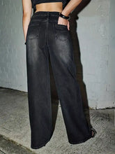 Black rhinestone embellished wide leg jeans with faded wash and classic back pockets showing the back side