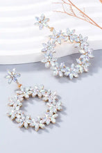 Two gold-toned rhinestone flower dangle earrings with crystal wreaths