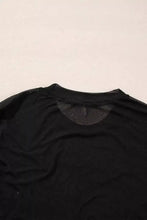 Black mesh rhinestone long sleeve bodysuit with a sheer semi-transparent back panel showing the back side