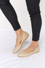 Beige rhinestone point toe flat slip-ons with glitter and sparkling gold accents