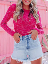 Fuchsia long sleeve bodysuit with white polka dots sheer mesh sleeves and round neck rhinestone detail