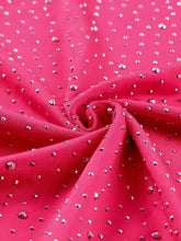 Vibrant pink rhinestone round neck long sleeve sleeve bodysuit featuring a dense pattern of sparkling silver rhinestones