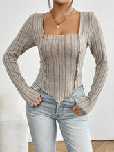 Ribbed decorative button long sleeve top with square neckline and V-hem