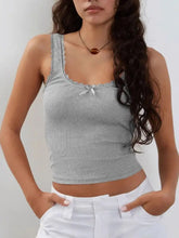 Gray ribbed knit crop top with lace trim and small bow at neckline in ribbed knit fabric for stylish layering