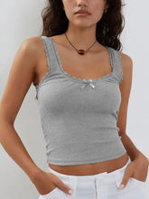 Gray ribbed knit cami top with lace trim and small bow at neckline in a ribbed knit fabric