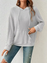 Light gray ribbed knit long sleeve drawstring hoodie with stretchy material and front pocket machine wash cold