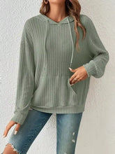 Soft sage green ribbed knit long sleeve hoodie with drawstring hood and front pocket machine wash cold