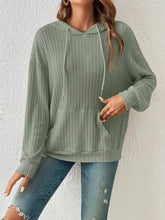Ribbed knit long sleeve hoodie in olive green with drawstring hood and front pocket machine wash cold recommended