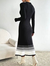 Black ribbed knit midi sweater dress with white striped hem