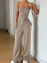 Beige ribbed corduroy strapless jumpsuit with tied waist detail