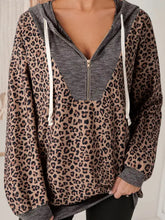 Ribbed leopard print contrast collar zip hoodie with slightly stretchy fabric, gray front panel, and white drawstrings, machine wash cold