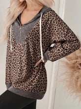 Ribbed leopard print contrast collar zip hoodie in cozy slightly stretchy fabric with gray panel and white drawstrings machine wash cold