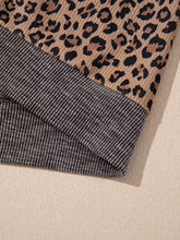 Ribbed leopard print contrast collar zip hoodie with beige and black corduroy fabric and ribbed gray cuff slightly stretchy