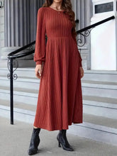 Ribbed rust-colored long sleeve knit midi sweater dress, fitted bodice