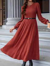 Ribbed rust-colored long sleeve midi sweater dress with fitted waist